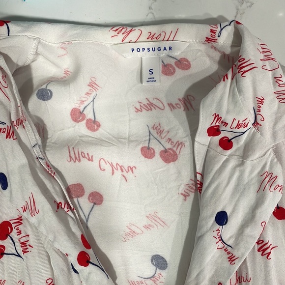 Cropped Mon Cheri shirt with button up & tie up bottom. Slightly worn, no damage - Picture 2 of 3